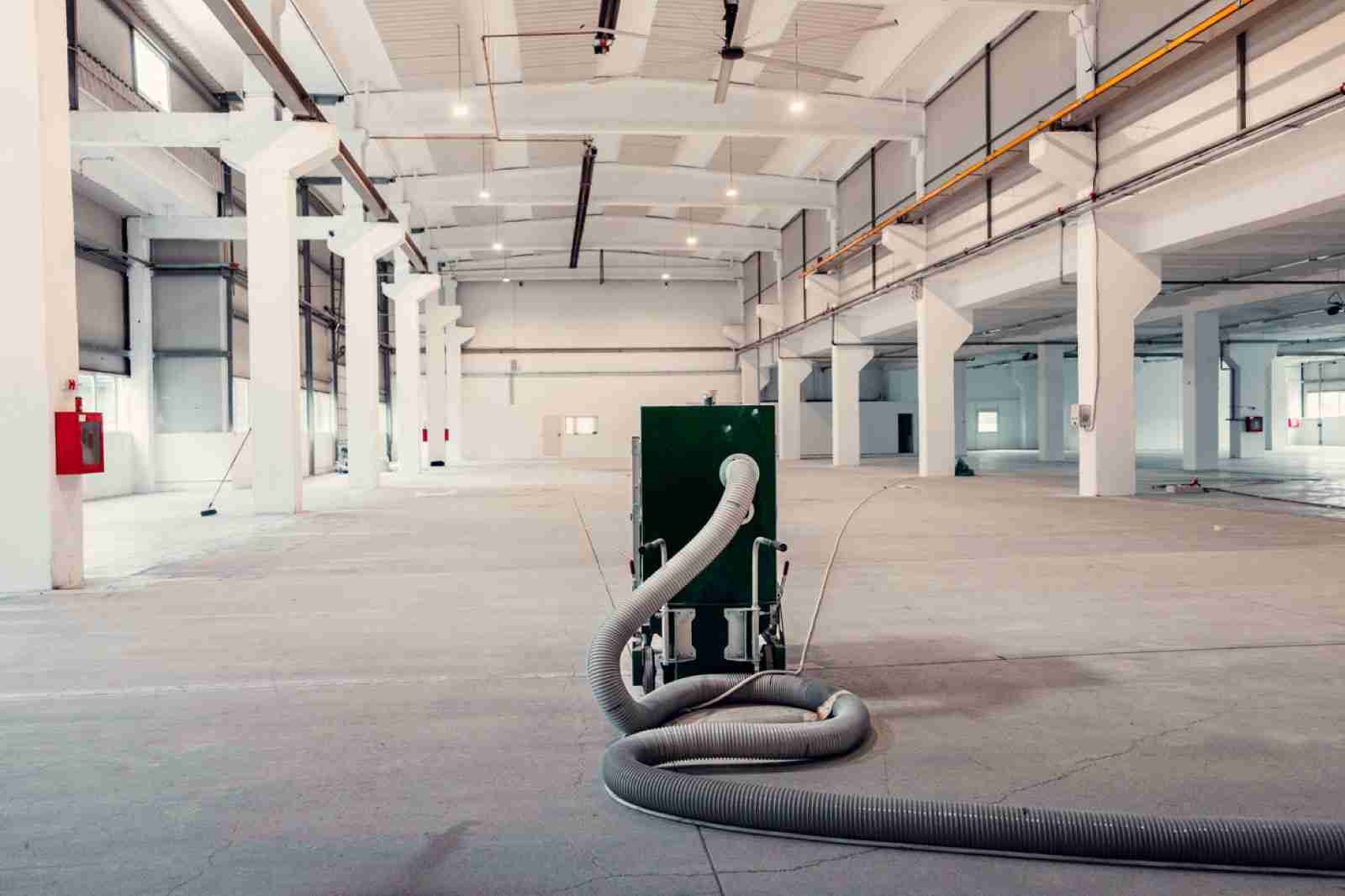 Post-construction cleaning crew removing dust and debris in Frederick MD